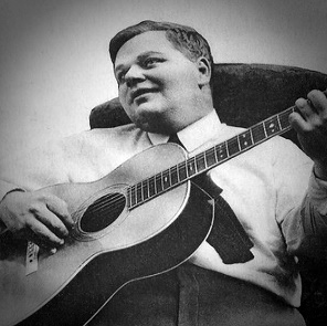 Roscoe playing guitar